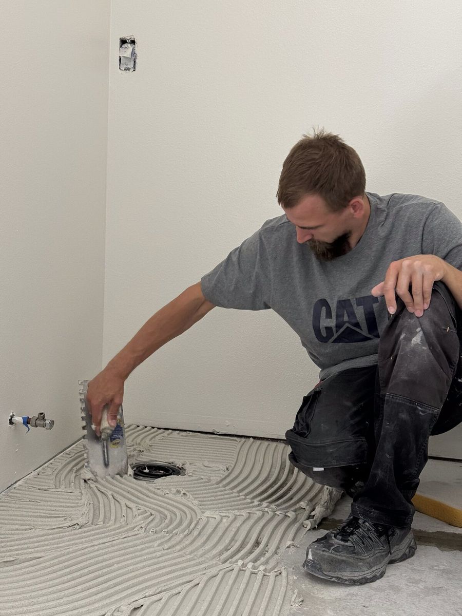 Full-coverage thinset — no hollow tiles a year later