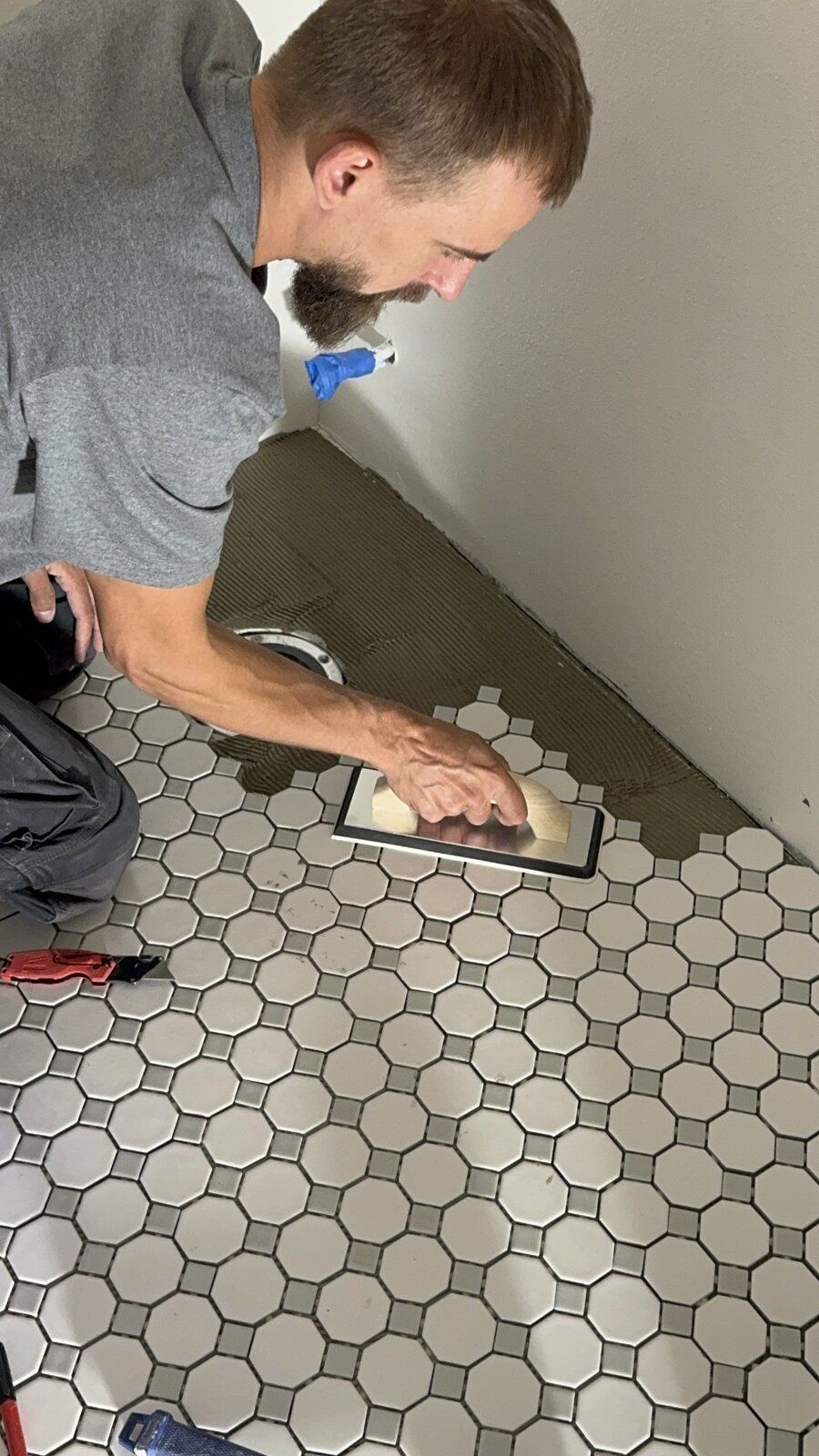 Tile set by hand, row by row